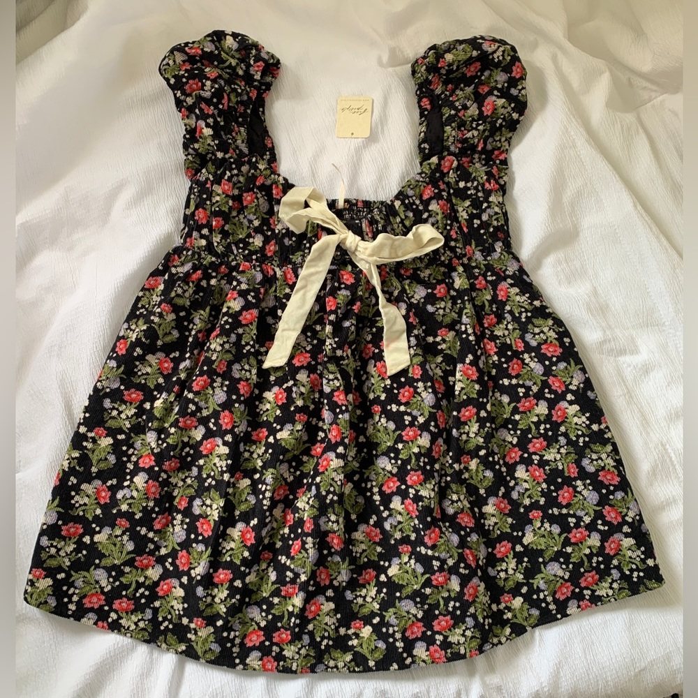 Floral Free People tunic with bow detail and pockets